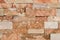 Grunge brown ,beige,orange,grey stone wall tiles texture backdrop.Wall natural brown stone dirty,dust.Wall and panel marble natura