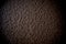 Grunge brown grained wall background or texture