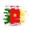 Grunge brush stroke with Cameroon national flag