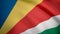 Grunge colorful flag Seychelles. Close up, fluttering downwind. Flag of Seychelles background