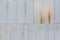 Grunge corrugated grey metal wall background.