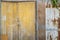 Grunge corrugated iron and yellow door