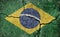Grunge country flag illustration cracked concrete background /  Brazil