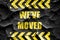 Grunge cracked We\'ve moved sign