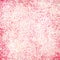 Grunge cream and pink speckled wall background