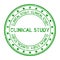 Grunge green clinical study word with star icon round rubber stamp on white background