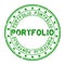 Grunge green portfolio word with star icon round rubber stamp on white background