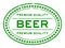 Grunge green premium quality beer word oval rubber stamp on white background