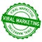 Grunge green viral marketing word round rubber stamp on white background