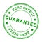 Grunge green zero defect guarantee word rubber seal stamp on white background