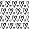 Grunge hand drawn hearts seamless pattern. Textured black ink paintbrush cute heart shapes vector background. Romantic simple