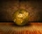 Grunge interior with golden world globe