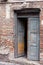 Grunge masonry house doors brick wall background