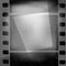 Grunge monochrome filmstrip with space for text . Film noir, old cinema background design template