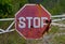 Grunge old stop traffic sign