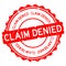 Grunge red claim denied word round rubber seal stamp on white background