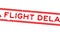 Grunge red flight delay word with plan icon square rubber stamp zoom on white background