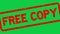 Grunge red free copy word square rubber stamp zoom on green background