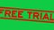 Grunge red free trial word square rubber stamp zoom on green background