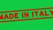 Grunge red made in Italy word rubber stamp zoom on green background