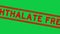 Grunge red phthalate free word square rubber stamp zoom on green background