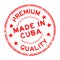 Grunge red premium quality made in Cuba round rubber stamp on white background