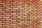 Grunge Red yellow beige tan fine brick wall texture background perspective, large detailed horizontal background