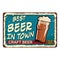 Grunge retro metal sign best beer in town. Glass of cold craft beer. Vintage poster. Road signboard. Old fashioned