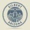 Grunge rubber stamp or label with text Gilbert, Arizona