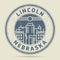 Grunge rubber stamp or label with text Lincoln, Nebraska