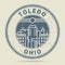 Grunge rubber stamp or label with text Toledo, Ohio