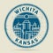 Grunge rubber stamp or label with text Wichita, Kansas