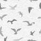 Grunge seamless pattern of flying birds white background