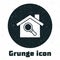 Grunge Search house icon isolated on white background. Real estate symbol of a house under magnifying glass. Monochrome