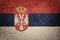 Grunge Serbian flag. Serbia flag with grunge texture