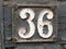 Grunge street sign with number 36