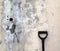 Grunge Stucco Wall with Work Spade