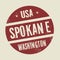 Grunge vintage round stamp with text Spokane, Washington