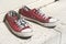 Grunge weathered red sneakers