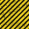 Grunge yellow black stripes, warning background