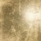 Grungy gold toned industrial distressed asphalt texture