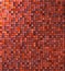 Grungy mosaic wall in red pink orange