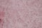 Grungy mottled pink parchment paper for a background