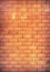 Grungy old red brick wall texture background with deterioration from age