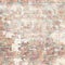 Grungy shabby vintage brick wall with floral pattern