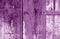 Grungy wooden planks background in purple color