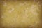 Grungy yellow mottled background texture