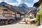 GRUYERE, CH, CIRCA JULY, 2016: View of the main street in the swiss town Gruyeres Switzerland on a beautiful summer day. Gruyere