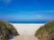 GrÃ¸nhÃ¸j beach nordjylland Denmark. Blue sky on the beach on a summer day.