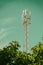 GSM cell transmission station and summer landscape with cloudy sky